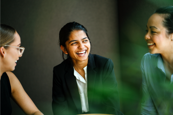 Three people laughing